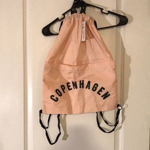 Cotton On: Pink Lightweight “Copenhagen” Drawstring Backpack with zipper pocket